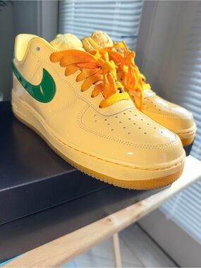 Nike Yellow Sneakers with Green Swoosh and Orange Laces
